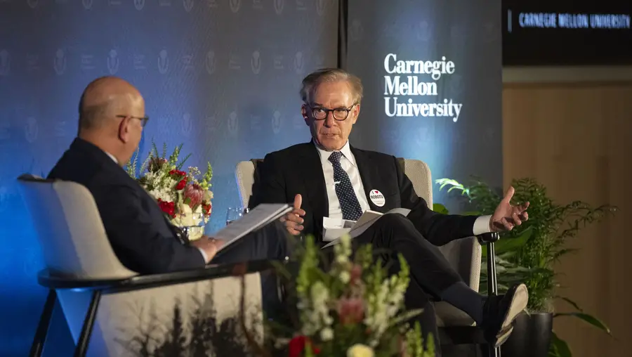 Farnam Jahanian and David Ignatius speak together on stage.